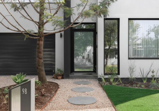 Details of landscaping and front door view - Thornbury passive house